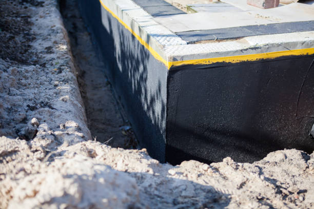 Professional Waterproofing technician working in South Solon, OH